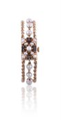 MOVIGA, LADY'S GOLD COLOURED, CULTURED PEARL AND SAPPHIRE CONCEALED BRACELET WATCH