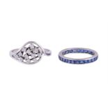 A SAPPHIRE ETERNITY RING AND A DIAMOND DRESS RING