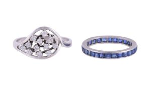 A SAPPHIRE ETERNITY RING AND A DIAMOND DRESS RING