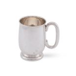 A SILVER OVOID FOOTED PINT MUG, VINERS LTD