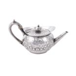 A GEORGE III SILVER CIRCULAR TEA POT, PAUL STORR