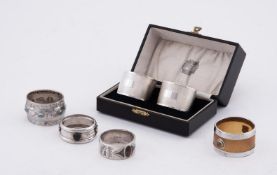 AN ARTS AND CRAFTS SILVER CYMRIC NAPKIN RING, LIBERTY & CO.