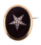 A LATE 19TH CENTURY DIAMOND AND ONYX BROOCH, CIRCA 1890