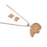 A GOLD COLOURED BEAR PENDANT AND NUGGET EAR STUDS