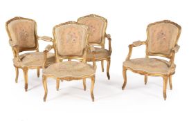 A set of four giltwood fauteuils in Louis XV style