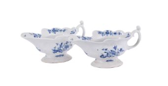 A pair of Worcester blue and white sauceboats painted with 'The Early Bird' pattern