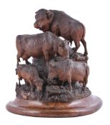 A 'Black Forest' carved walnut model of a herd of cattle