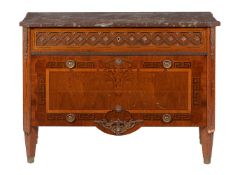 A mahogany and inlaid commode in French late 18th century taste