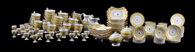 An English porcelain yellow ground and part gilt part breakfast service