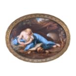 A Meissen miniature oval gilt-metal-mounted plaque of Mary Magdalene reading in the wilderness