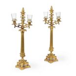 A pair of French second Empire gilt metal and bronze four light candelabra