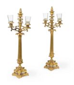 A pair of French second Empire gilt metal and bronze four light candelabra