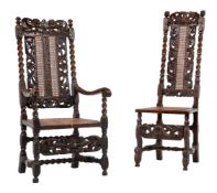 Two similar carved walnut chairs