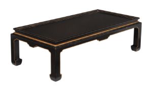 A black painted and parcel gilt low centre table in Chinoiserie taste