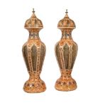 A pair of gilt metal and stained bone floor standing lanterns