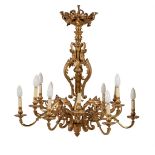 A twelve light brass and gilt chandelier in French taste