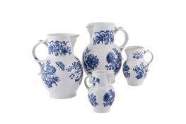 Four Worcester blue and white 'Natural Sprays Group' pattern cabbage leaf-moulded mask jugs
