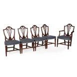 A set of eight George III dining chairs