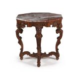 A Continental walnut octagonal table