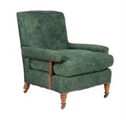 A late Victorian walnut and upholstered armchair