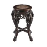 A Chinese carved wood stand with marble top