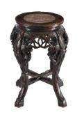 A Chinese carved wood stand with marble top