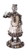 Y A German silver and mother of pearl standing figure