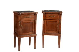 A pair of French walnut and bedside cabinets