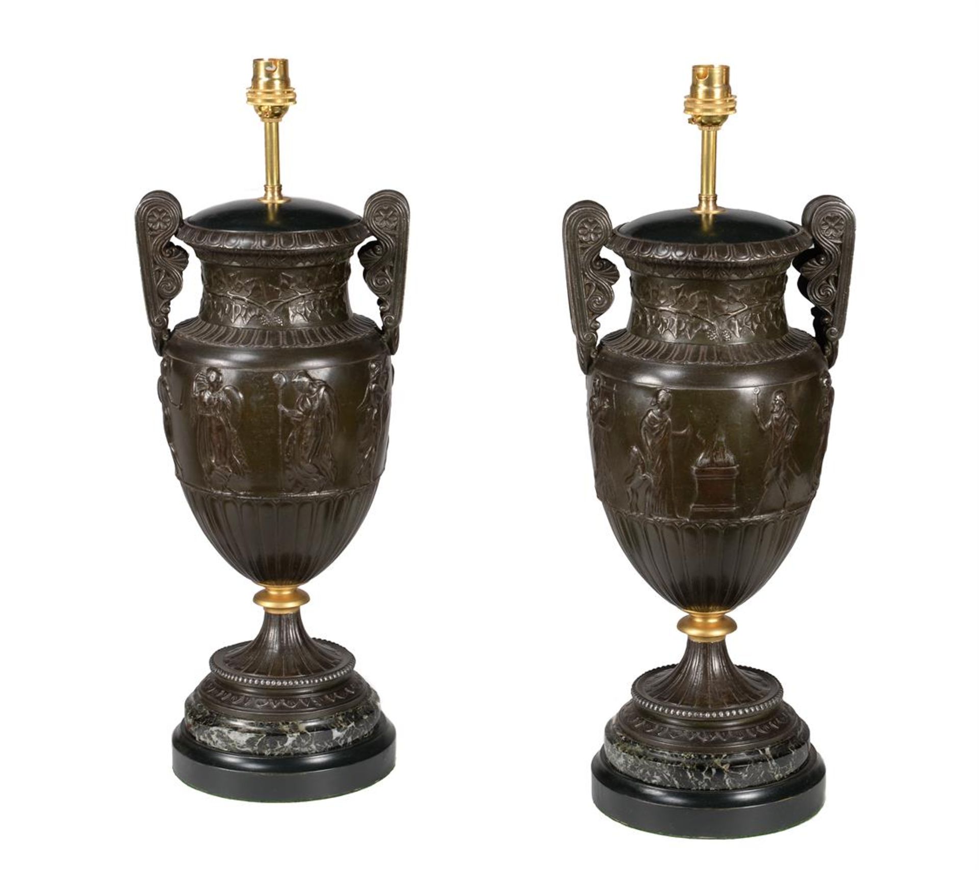 A pair of French bronze patinated spelter urns