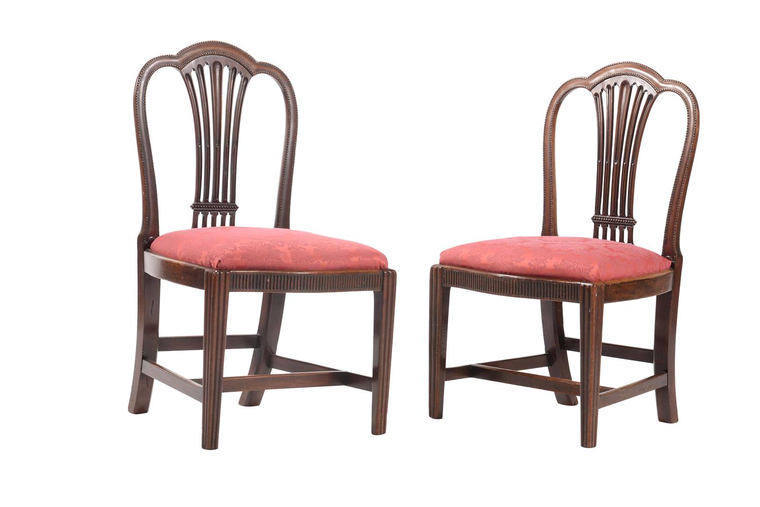 A set of six George III mahogany dining chairs