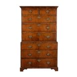 A George II walnut and feather banded chest on chest