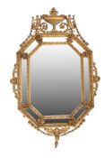 A Continental giltwood and composition marginal wall mirror