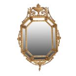 A Continental giltwood and composition marginal wall mirror