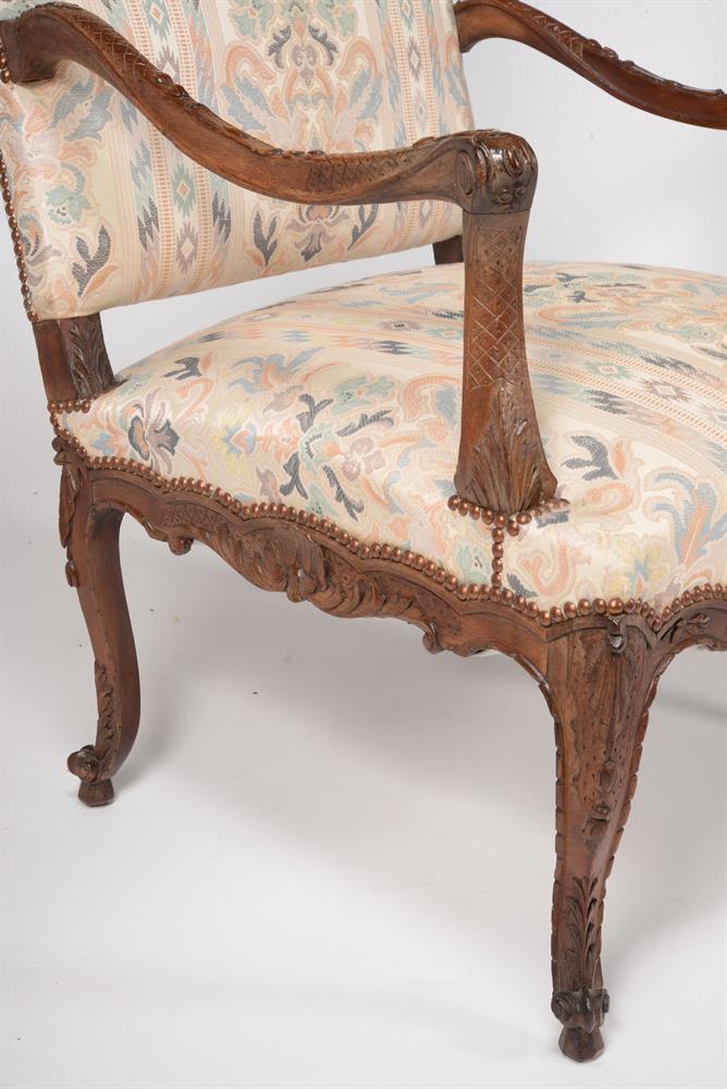 A pair of carved walnut armchairs in Louis XV style - Image 2 of 2