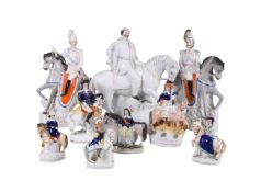 A group of nine various Staffordshire equestrian figures