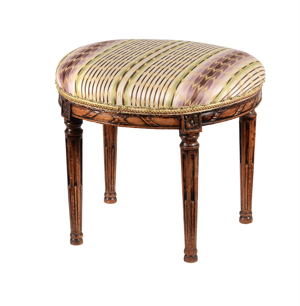 A Louis XVI walnut stool