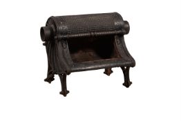 A Victorian cast iron wood burning stove or Nautilus Grate
