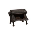 A Victorian cast iron wood burning stove or Nautilus Grate