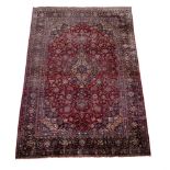 A Kashan silk carpet