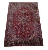 A Kashan silk carpet