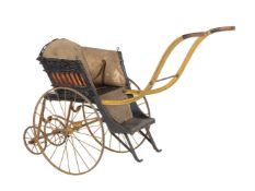 A Victorian painted iron, wood and wicker child's pram