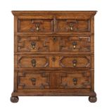 A Charles II oak chest of drawers