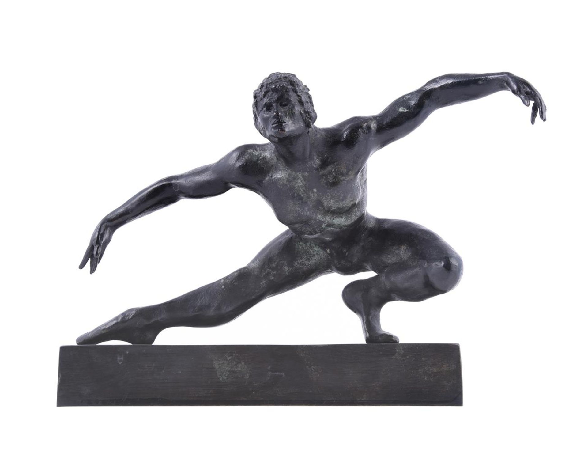 A bronze model of a male ballet dancer