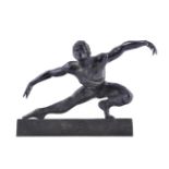 A bronze model of a male ballet dancer