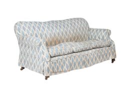 A late Victorian mahogany and upholstered sofa