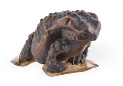 A Japanese root wood carving of a Warty Toad
