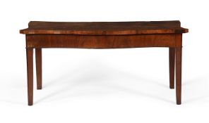 A George III mahogany serpentine serving table