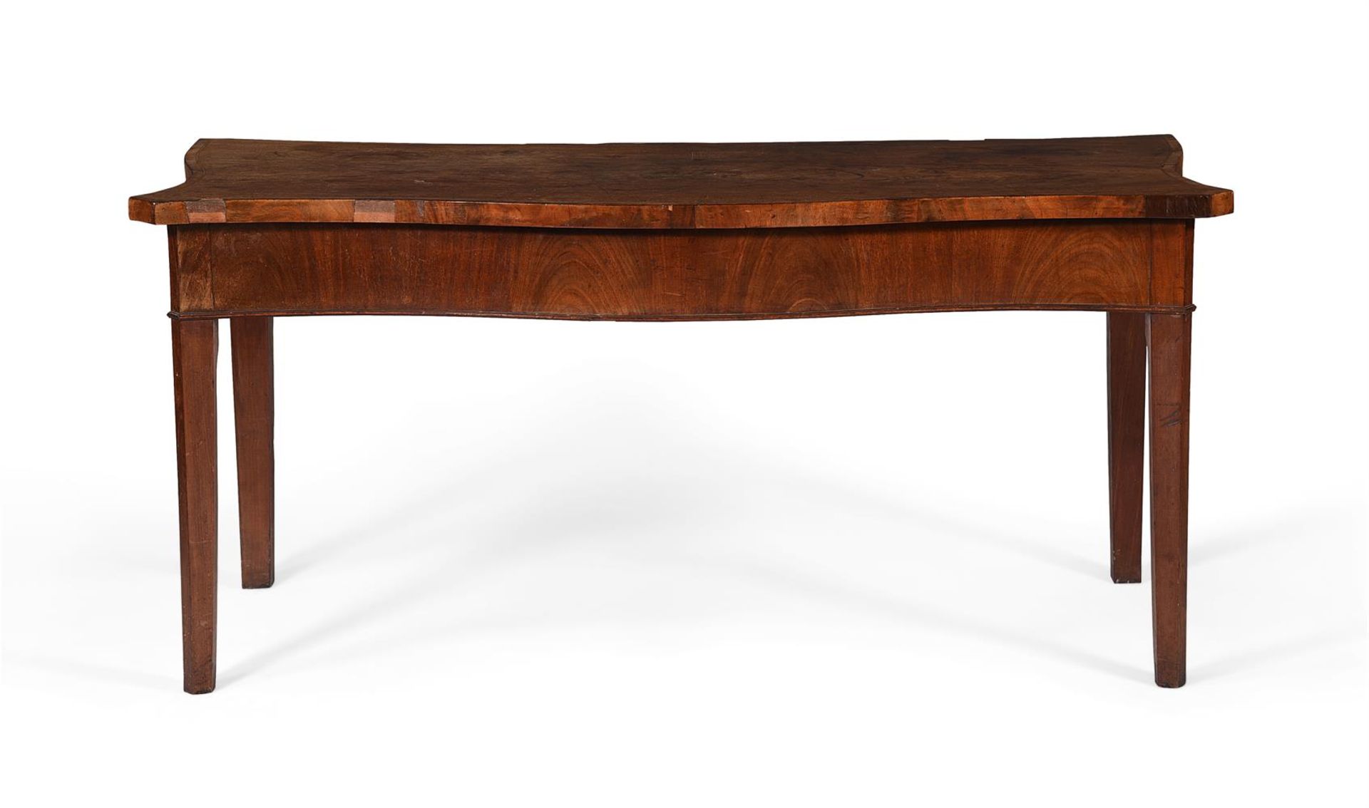 A George III mahogany serpentine serving table