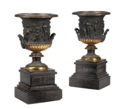 A pair of French gilt and patinated bronze models of the Borghese vase