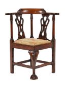 A mahogany child's corner armchair in George III style